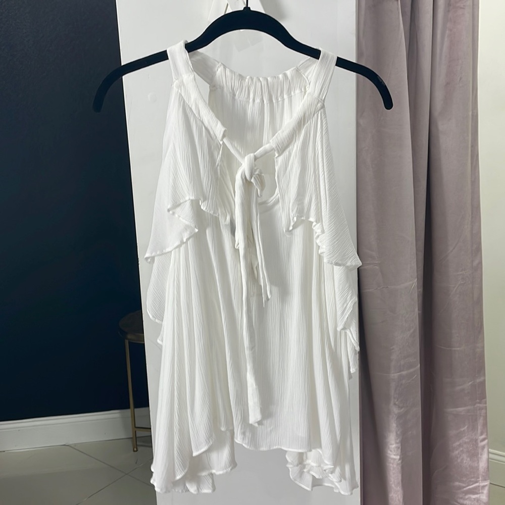 White sheer top with sleeves and ruffles